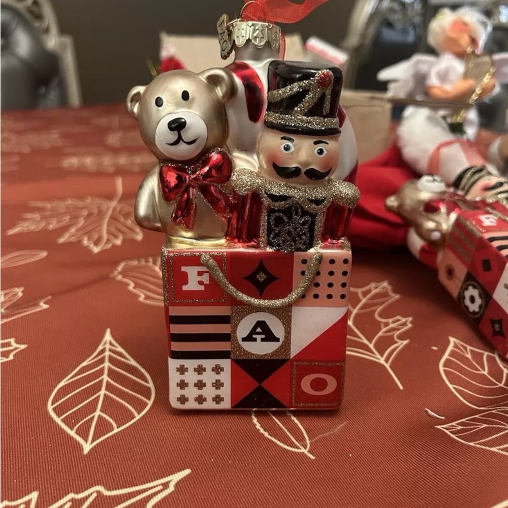 FAO Schwarz Nutcracker Soldier & Bear in Gift Bag Ornament Hand Blown Glass 2018